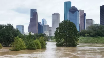 Flooded park agains the downtown Houston skyline