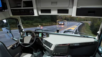 Inside of self-driving truck on road.