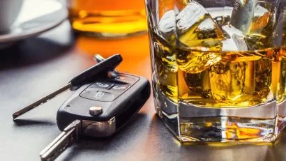 Close-up of car keys sitting on bar top next to car keys with fob.