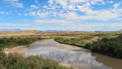 Blue sky above Rio Grande River on Texas/Mexico border.