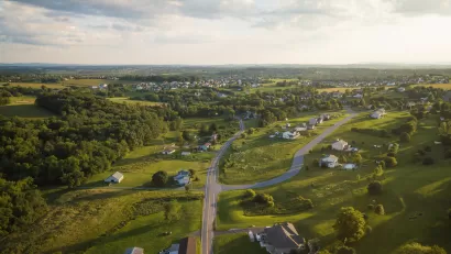 Aerial view of green rural community with houses in Pennsylvania.