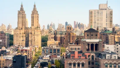 View of buildings of various heights and styles in New York City.