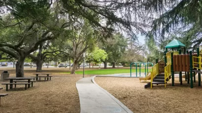 Playground and picnic benches in city park in San Francisco Bay Area.