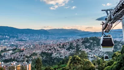 Aerial gondola car in the air overlooking the city of Medellin, Colombia.