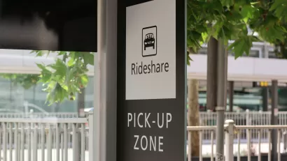 Black and white Rideshare Pick-Up Zone sign