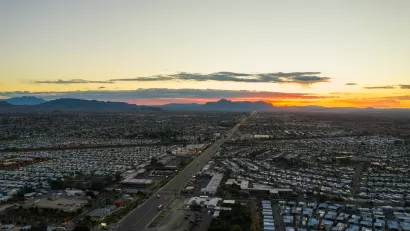 Aerial view of mobile home park next to freeway in Mesa, Arizona