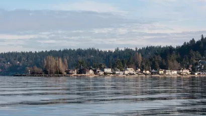 View across lake of small town of Burien in Washington state.