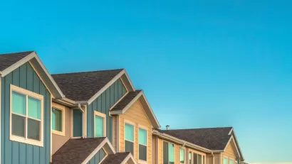 View of upper story of row of townhomes.