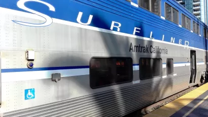Blue and silver Pacific Surfliner train at platform in San Diego, California.