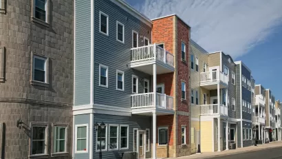 Colorful three-story multifamily housing.