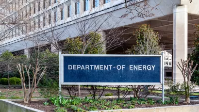 Department of Energy sign in front of modernist building in Washington, D.C.