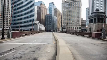 Empty street and high-rise buildings in downtown Chicago, Illinois during COvid-19 pandemic.