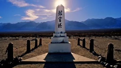 White obelisk monument with Japanese writing at Manzanar Historic Site, former internment camp, California