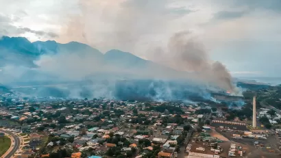 Aerial view of Lahainaluna neighborhood with smoke from fires in Maui, Hawaii.