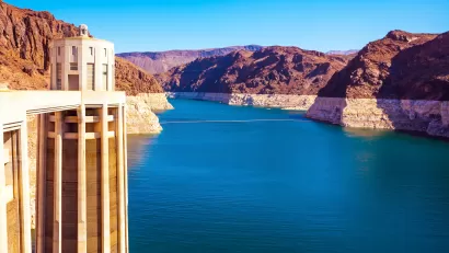 View of Colorado River from top of Hoover Dam with concrete column on left