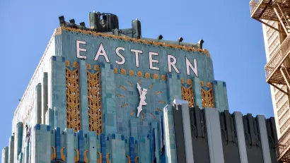 Close-up of top of ornate Art Deco blue tile Eastern building in downtown Los Angeles