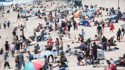 A crowded sunny day at Santa Monica beach