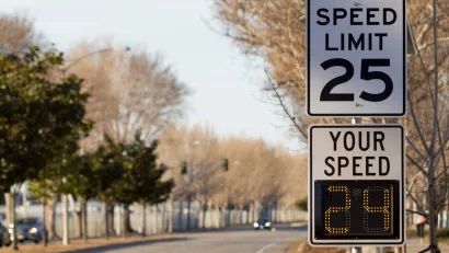 25mph speed limit sign with digital "Your Speed" sign below it.