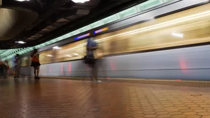 Blurred train in motion passing through underground station in Washington, D.C.