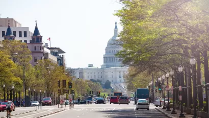 View down Pennsylvania Avenue with U.S. capitol in background and bike lane in middle of street