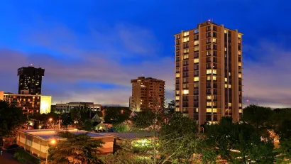 Buildings in downtown Springfield, Missouri at dusk.