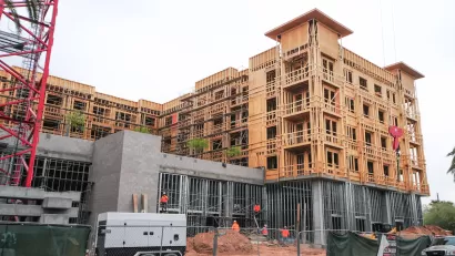 Five-story apartment building under construction.