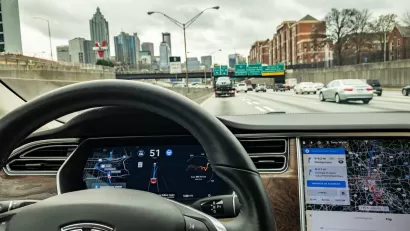 Tesla self-driving car view from inside dashboard.