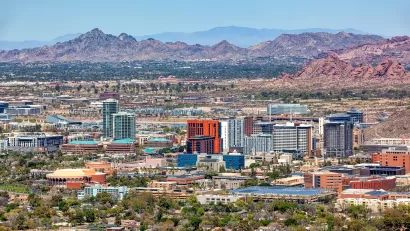 Aerial view of Tempe, Arizona with mountains in background