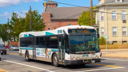 White and green Rhode Island Public Transit Agency bus