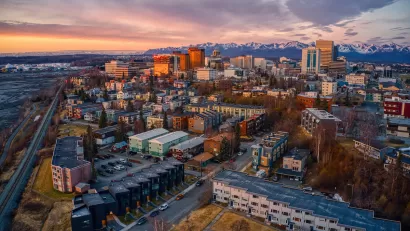 Aerial view of Anchorage, Alaska at sunrise or sunset.