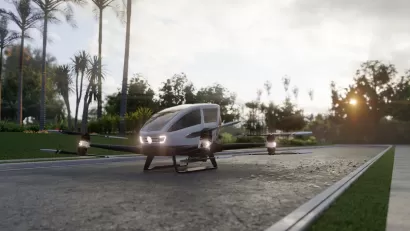 Rendering of small autonomous 'air taxi' parked on gray stone driveway.