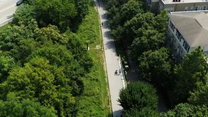 Aerial view of Atlanta BeltLine paved bike trail surrounded by green trees
