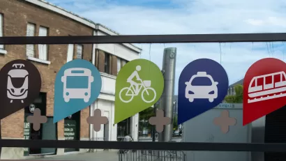 Sign with icons indicating access to multiple transportation modes in Le Havre, France