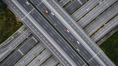 Overhead view of multilane elevated highway with multiple levels.