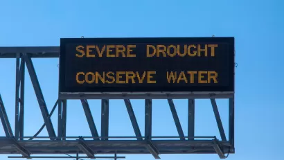 "Severe Drought - Conserve Water" freeway sign.