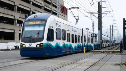 Bllue and white Link light rail train in Tukwila, Washington.
