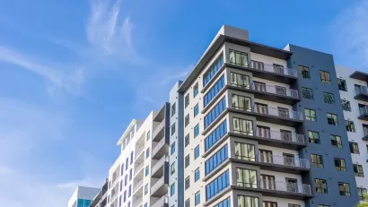 Multifamily building with blue sky in the background.