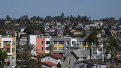 View of dense San Diego neighborhood with multi-family buildings.