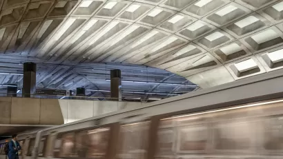 Blurred image of train passing by platform at Washington, D.C. undergroundtrain station