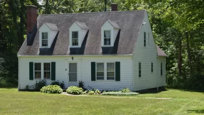 Craftsman-style white kit home from Sears catalog sold in early 20th century