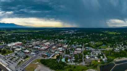 Aerial view of Whitefish, Montana with storm clouds in background