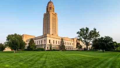 Nebraska capitol building against a blue sky