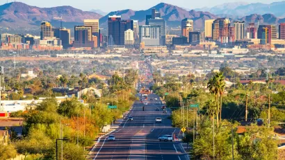 Phoenix, Arizona skyline with mountains in background.