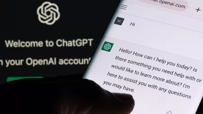 close-up of person using ChatGPT app on mobile phone.
