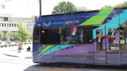 Blue Atlanta streetcar on street in downtown Atlanta, Georgia.