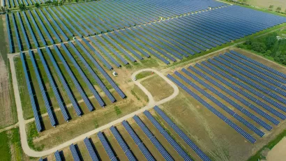 Aerial view of large solar panel installation in rural area in Indiana.