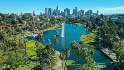 Downtown Los Angeles viewed from Echo Park with lake with artesian fountain in foreground.