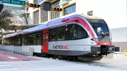 Red and silver MetroRail train in Austin, Texas.
