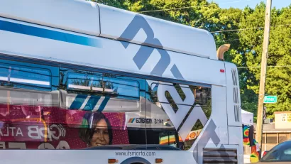 Close-up of front og MARTA public transit bus in Atlanta, Georgia with logo wrap