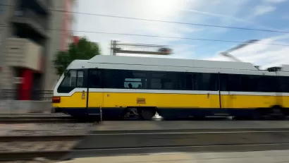 Blurred image of speeding DART light rain train in Dallas, Texas